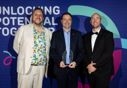 DEA Hall of Fame inductee Professor Alastair McEwin AM is holding his trophy and standing between DEA CEO Peter Bacon (left) and DEA Chair Mat McIntyre (right)